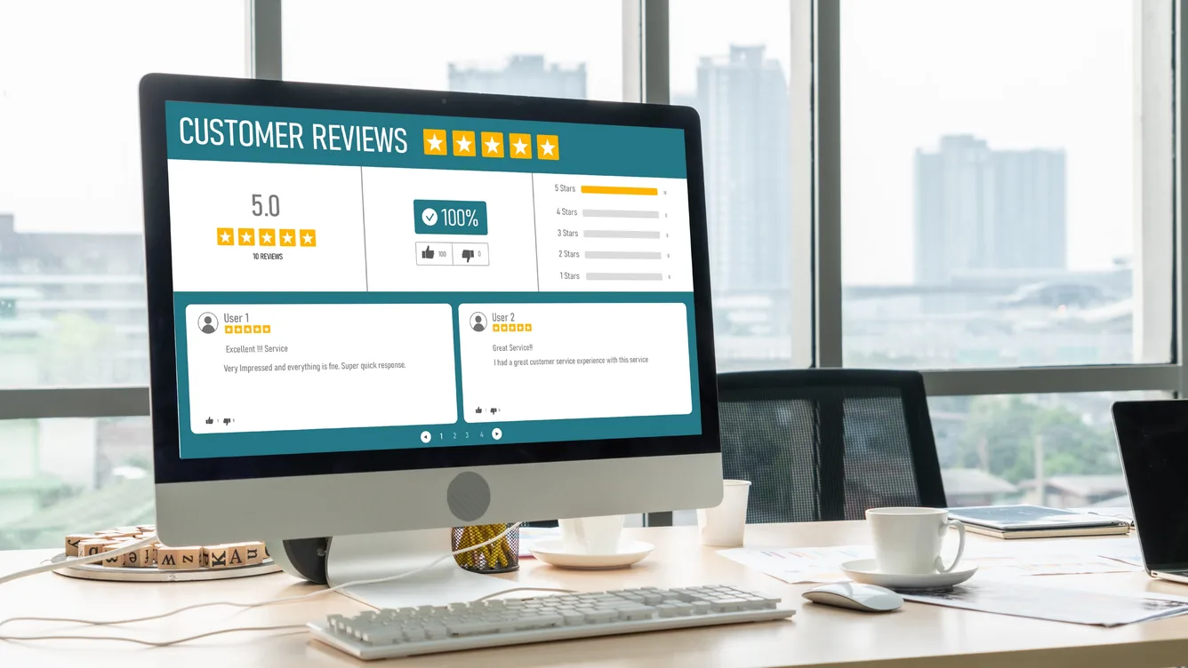 Online review and rating dashboard displayed on a desktop monitor