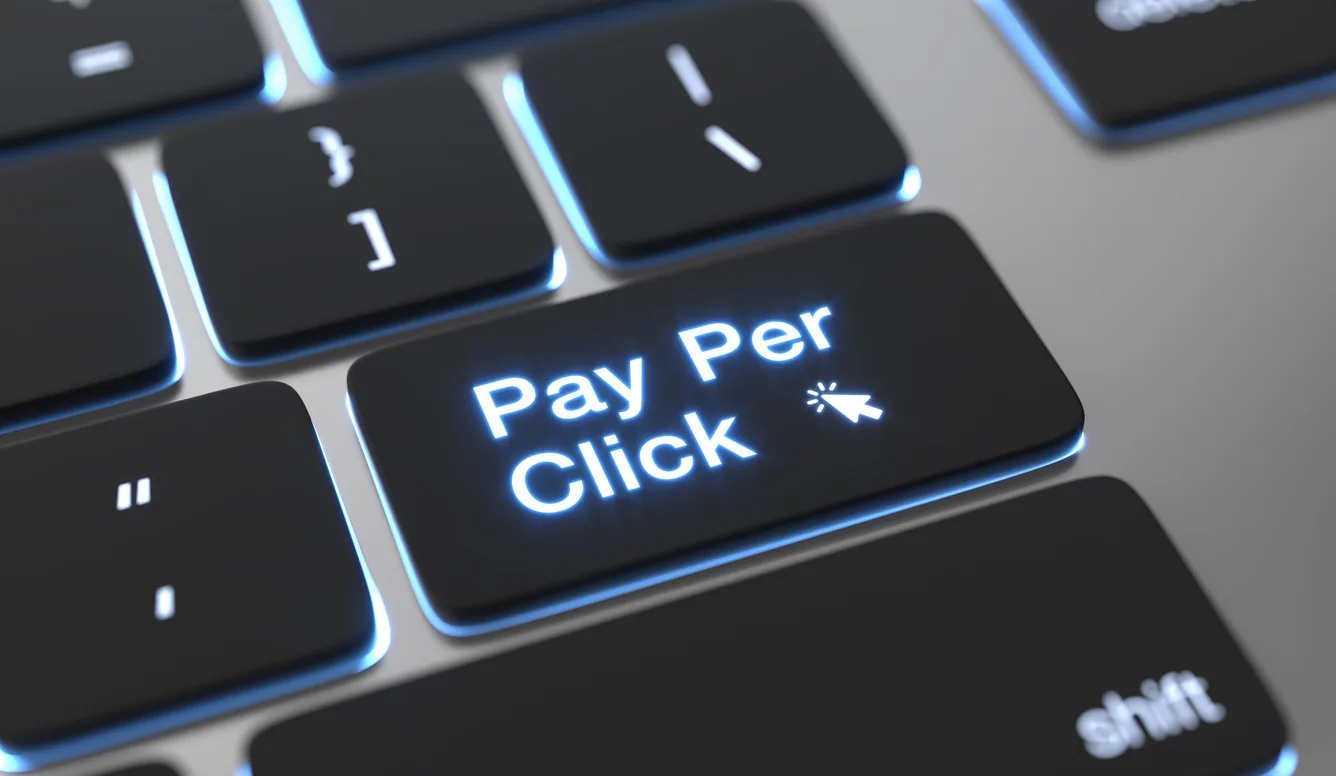 Pay-per-click advertising campaign dashboard on a keyboard close-up